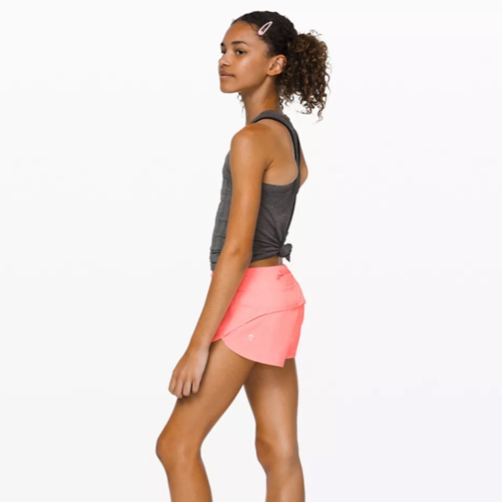 Ivivva (lululemon) Girls size 12 shorts, bleached coral, EUC